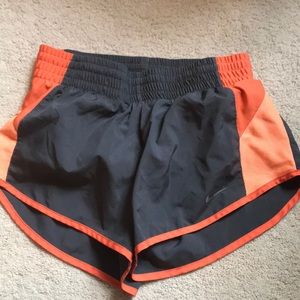 Grey and orange Nike shorts